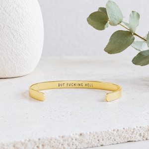 Hidden message bracelet with This Too Shall Pass outside and But Fucking Hell inside