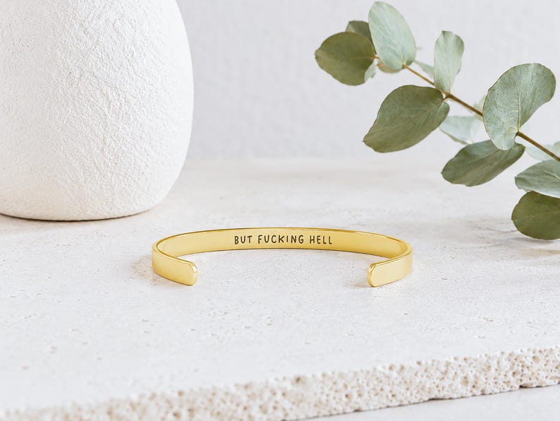 Hidden message bracelet with This Too Shall Pass outside and But Fucking Hell inside