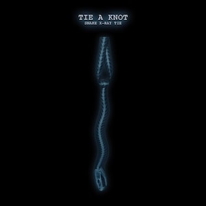 May include: A necktie featuring a blue-toned X-ray graphic of a snake skeleton against a black background. The text TIE A KNOT and SNAKE X-RAY TIE is printed in white above the graphic. The skeletal structure shows the spine and skull.