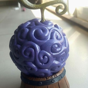 Gomu Gomu no Mi Figurine – One Piece Devil Fruit with Base – 3D Geek Decoration