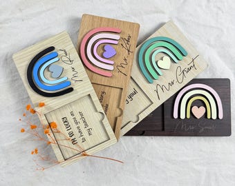 May include: Wooden teacher appreciation gifts featuring rainbow designs and heart accents. Each bookmark has a unique rainbow color scheme and personalized text, including "I'M SO LUCKY to have you as my teacher."