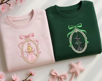 Bluza z haftem Wicked: Koszulka inspirowana Czarnoksiężnikiem z Krainy Oz w kolorze różowo-zielonym