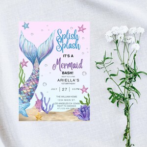 May include: A mermaid-themed invitation with a pink and blue color scheme. The invitation features a mermaid tail, starfish, and the text "Splish Splash, It's a Mermaid Bash!" with event details. White flowers are in the background.