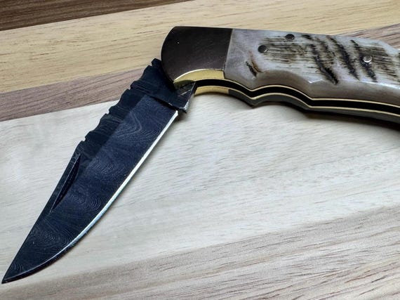 Handmade Jakob's Damascus Steel Folding Knife: Rams Horn Handle