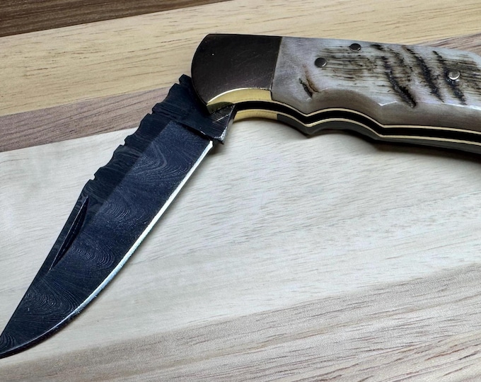 Handmade Damascus Steel Folding Knife: Rams Horn Handle
