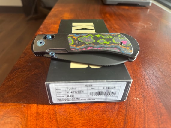 Kizer Tycho M390 titanium & 80’s camo handle, clutch lock