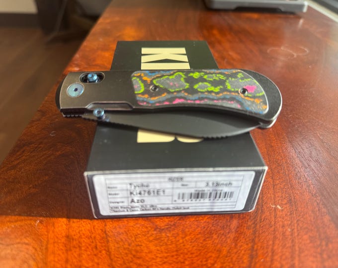 Kizer Tycho M390 titanium & 80’s camo handle, clutch lock