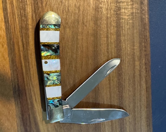 Handmade stainless steel Folding Knife, resin scales.