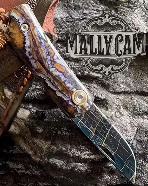 Handmade Jakob’s Fossilized pocketknife with Blue Swedish Damascus Steel