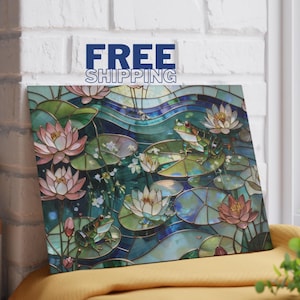 May include: A stained glass-style artwork depicting a pond scene with frogs and lily pads. The artwork features green frogs, pink and white water lilies, and the text "FREE SHIPPING" at the top. The overall color palette is dominated by greens, blues, and pinks.