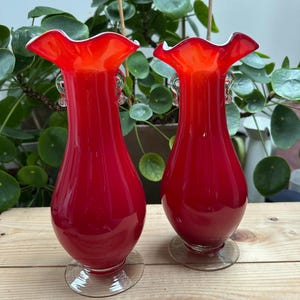 Pair of red Murano-style glass vases with ruffled edge