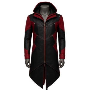 May include: Black and red hooded coat with a zipper closure. The coat features red accents on the shoulders, sleeves, and hood, with black panels on the front and back. The coat has a long, tailored fit and is displayed on a mannequin.