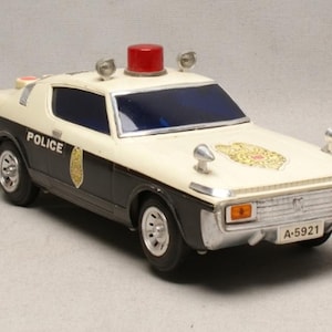 Vintage japanische Alpen Landstraßenpatrouille Polizeiauto | Funktionierendes batteriebetriebenes Plastikspielzeug | Klassisches Retro Display Stück