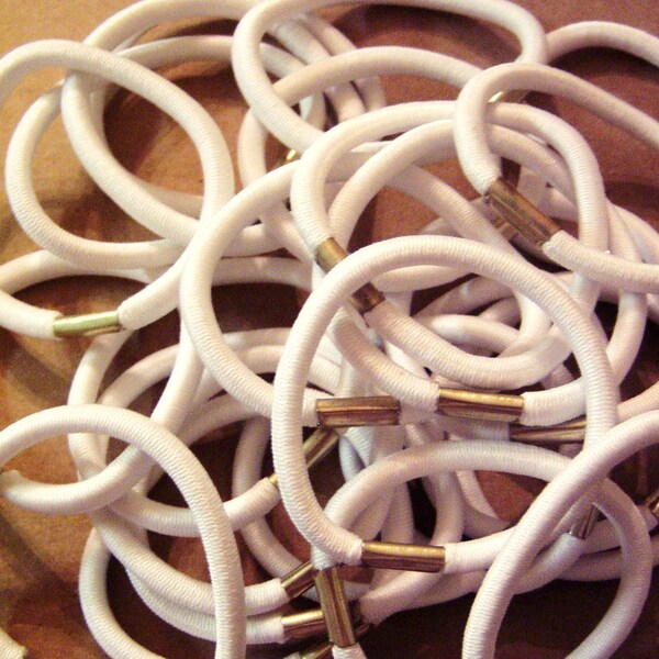 25 Pony Os White with Metal 3/16 inch for Cheerleading, Pony Tail Streamers