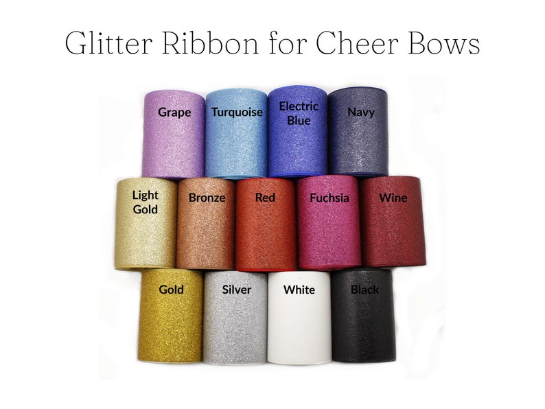 May include: Assortment of glitter ribbon rolls in various colors, including grape, turquoise, electric blue, navy, light gold, bronze, red, fuchsia, wine, gold, silver, white, and black.  Glitter Ribbon for Cheer Bows.