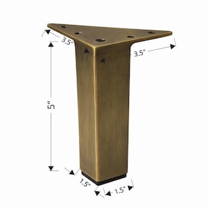 May include: A bronze-colored furniture leg with a triangular top and a rectangular base. The leg is 5 inches tall, with the top measuring 3.5 inches on each side and the base measuring 1.5 inches on each side.