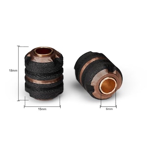 May include: Two cylindrical objects with a black woven exterior and copper-colored metal accents. One is upright, the other tilted. Measurements are provided: 18mm high, 15mm wide, and 6mm in diameter.