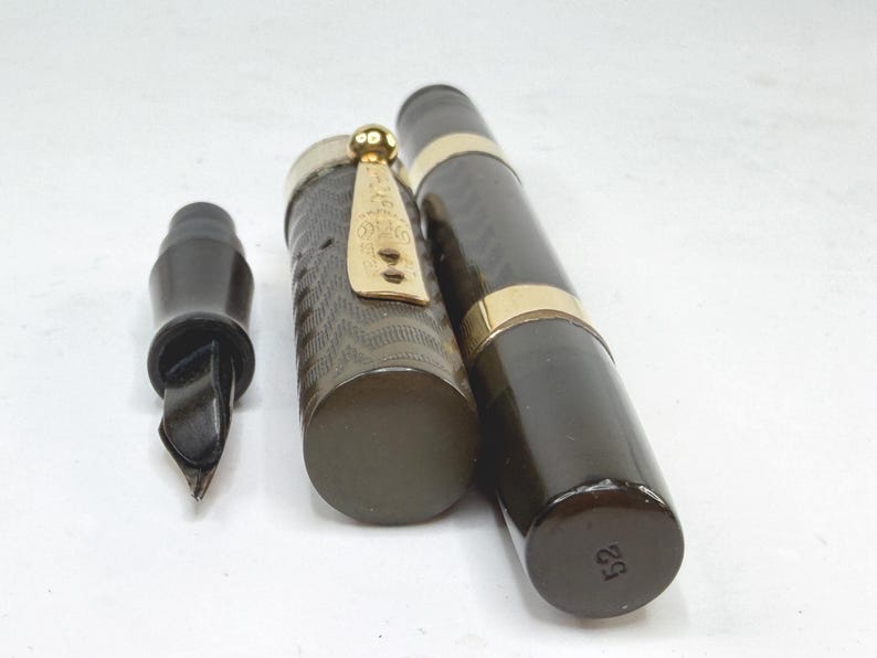 May include: A set of three ceramic mugs with a speckled, matte finish. Each mug features a different color: light blue, cream, and gray. The mugs have a simple, modern design and a comfortable handle.