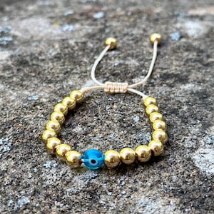 Vergoldetes Evil Eye Armband, handgemachter Schutzschmuck, Schutzgeschenk, verstellbare Passform, Perlenschmuck für jeden Tag, Glücksbringer