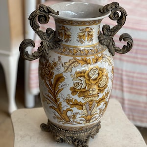 Elegance Embodied: Vintage Porcelain Vase with Ornate Floral Motif