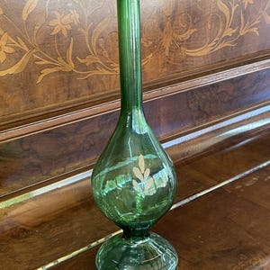 Beautiful Vintage Green Perfume Bottle With Gold Decorative Details And Handmade Designs