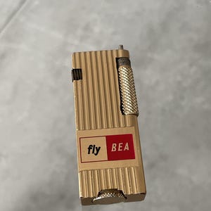 Vintage British European Airways (BEA) Promotional Gold-Toned Lighter, Mid-Century Aviation Collectible