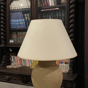 Rustic Mid-Century Ceramic Table Lamp with Textured Base and Neutral Shade