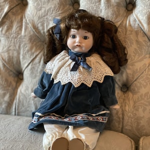 Vintage Porcelain Doll with Deep Blue Velvet Dress – 1980s Handcrafted Collectible