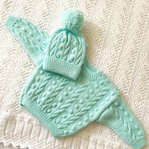 Hand knitted babies jumper and hat