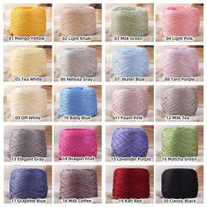 May include: A collection of twenty skeins of yarn in various colors, including yellow, pink, blue, and green. Each skein is labeled with a color name, such as "Mango Yellow" and "Light Khaki."
