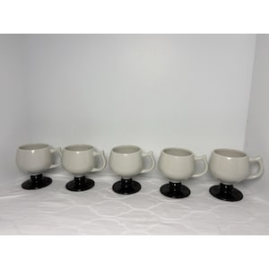 May include: A rustic wooden sign with the text "Welcome to our home" in white lettering. The sign features a distressed finish and a simple, inviting design, perfect for a front porch or entryway.