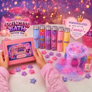 May include: A Princess Bath Potion Box set with DIY foamy bath potions. The set includes a pink box, glass vials with colorful contents, and star and heart-shaped bath bombs. The box is personalized with the name "Emma".