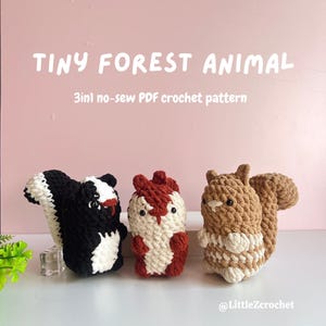 May include: Three crocheted forest animal toys: a skunk, a fox, and a squirrel. The skunk is black and white, the fox is red and cream, and the squirrel is brown and cream. The text "TINY FOREST ANIMAL" and "3in1 no-sew PDF crochet pattern" are displayed.