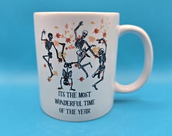 Dancing Skeleton Mug – "It’s the Most Wonderful Time of the Year" Funny Halloween Coffee Cup | Spooky Autumn Gift | Best Selling Mug