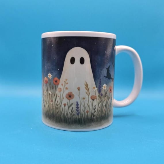 Cute Ghost Mug – Spooky Floral Coffee Cup, Halloween Gift, Cozy Autumn Mug, Whimsical Ghost in Wildflowers, Best Selling Mugs