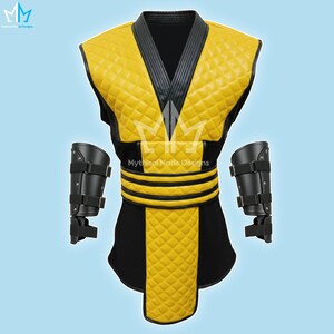 May include: A yellow and black costume with quilted detailing, featuring a V-neck design and black accents. Includes matching black arm guards. The text "Mythical Made Designs" is visible on the costume.
