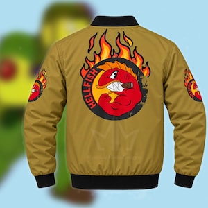 May include: A tan bomber jacket with black ribbed collar, cuffs, and hem. The back features a large graphic of a red, muscular fish with a cigar, surrounded by orange flames and the text HELLFISH. Smaller matching logos appear on each sleeve.