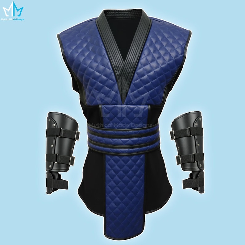 May include: A blue and black costume with a quilted pattern, featuring a V-neck design and black accents. Includes matching black arm guards with adjustable straps. The costume is likely for cosplay or themed events.