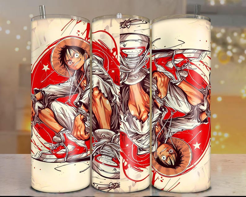 May include: A set of three stainless steel tumblers featuring a vibrant anime-style illustration. The design showcases a character in a straw hat, white outfit, and red sneakers, set against a red and white background. Each tumbler has a straw.