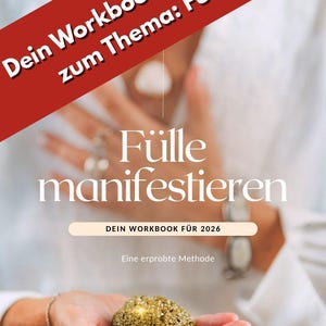 Könnte beinhalten: Ein Arbeitsbuchcover mit dem deutschen Text "Dein Workbook für 2026 zum Thema: Fülle". Eine Person hält einen goldfarbenen Stein. Die Worte "Fülle manifestieren" sind ebenfalls sichtbar.