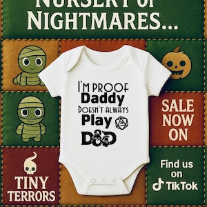 May include: White baby onesie with the text "I'M PROOF Daddy DOESN'T ALWAYS Play D&D" against a backdrop of Halloween-themed graphics and text. The background includes the text "WELCOME TO THE NURSERY of NIGHTMARES..." and "TINY TERRORS".
