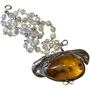 Vintage glass necklace with amber-color pendant
