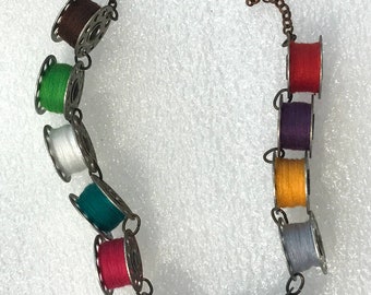 Vintage style threads' spools multi colours necklace