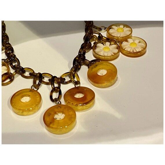 Vintage translucent root-bear celluloid flowers n… - image 8