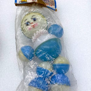 Vintage 1950&#39;s celluloid crib toy rattle doll made in Hong Kong