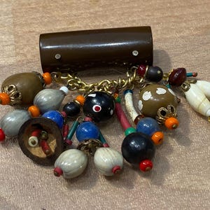Vintage unusual and rare charms &quot;forget me not&quot; pin brooch - Cracker Jack Gumball Prizes toys - tiny dolls