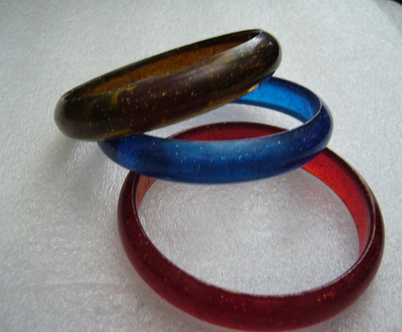 Vintage plastic red blue and brown bangles with I… - image 1