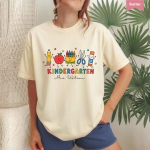 Custom Kindergarten Teacher Shirt, Teacher Life Tee, Preschool Teacher School Supplies Comfort Colors® T-shirt, Crayon Apple Pencil Shirt T2 Butter