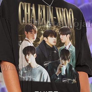 May include: Black unisex t-shirt with gold text reading "CHA EUN-WOO" and a collage of five men. The shirt also has the text "SHIRT Unisex". The first model is wearing a 2XL unisex shirt.