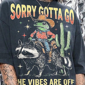 Sorry Gotta Go The Vibes Are Off Comfort Colors® Tshirt, Retro Cowboy Frog Riding Raccoon Funny Graphic Tees, Y2K Meme Streetwear,